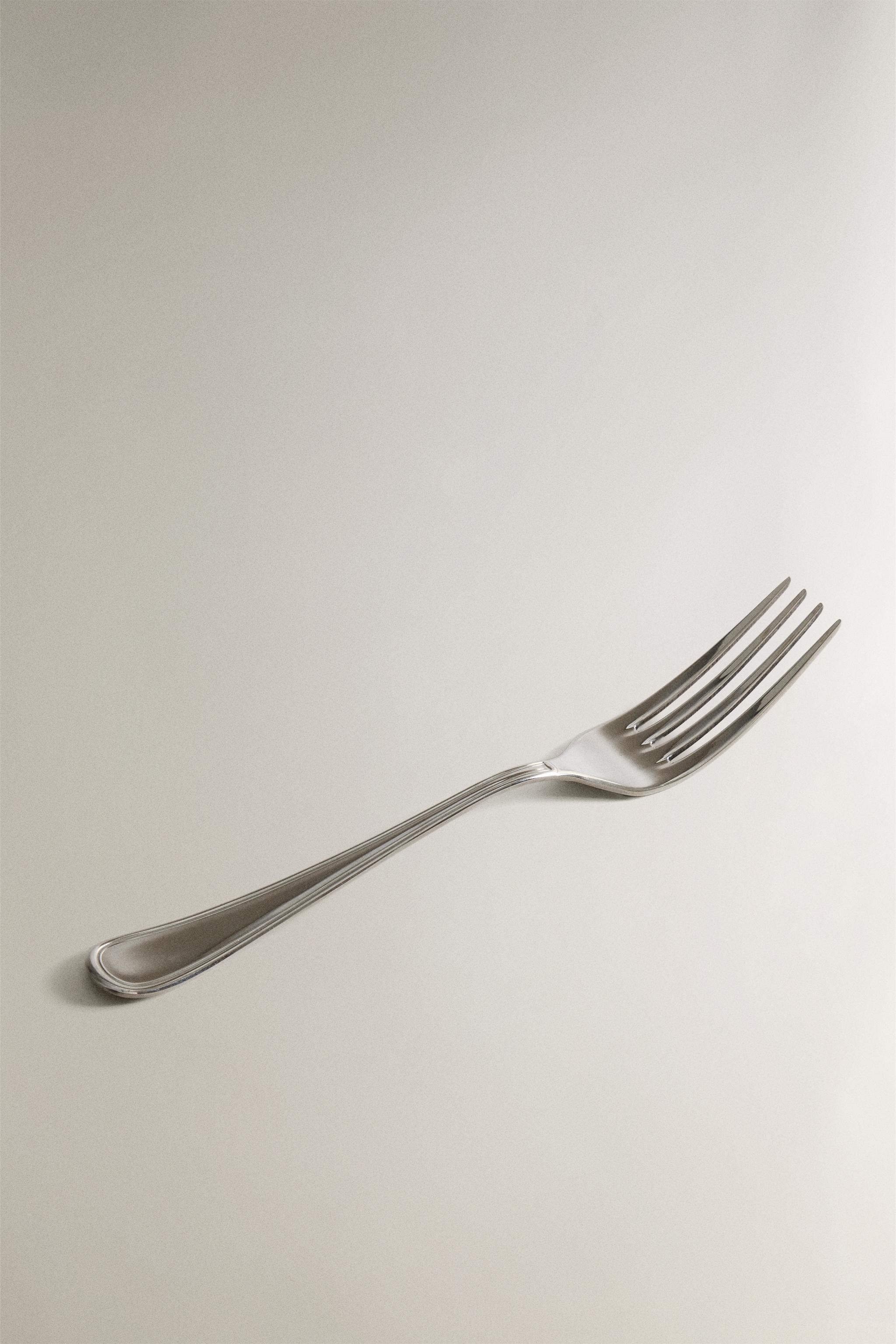 SHINY STEEL SERVING FORK